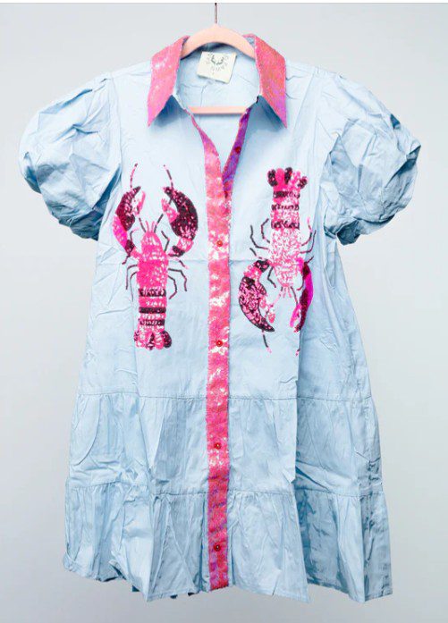 Light blue dress with pink lobster prints and button-down design.