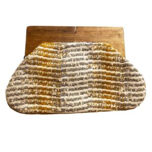 Ancient inscribed clay tablet with cuneiform writing.