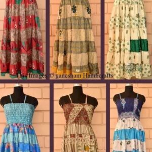 Display of six colorful traditional dresses on mannequins in two rows.