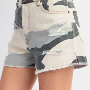 Distressed camo shorts with frayed hems and pocket details.