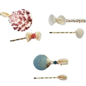 Decorative hairpins with shell and pearl designs.
