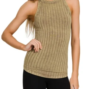Sleeveless ribbed beige top paired with black pants.